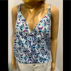 G by Guess summer top. Worn only a few times. Size S but loose fit.